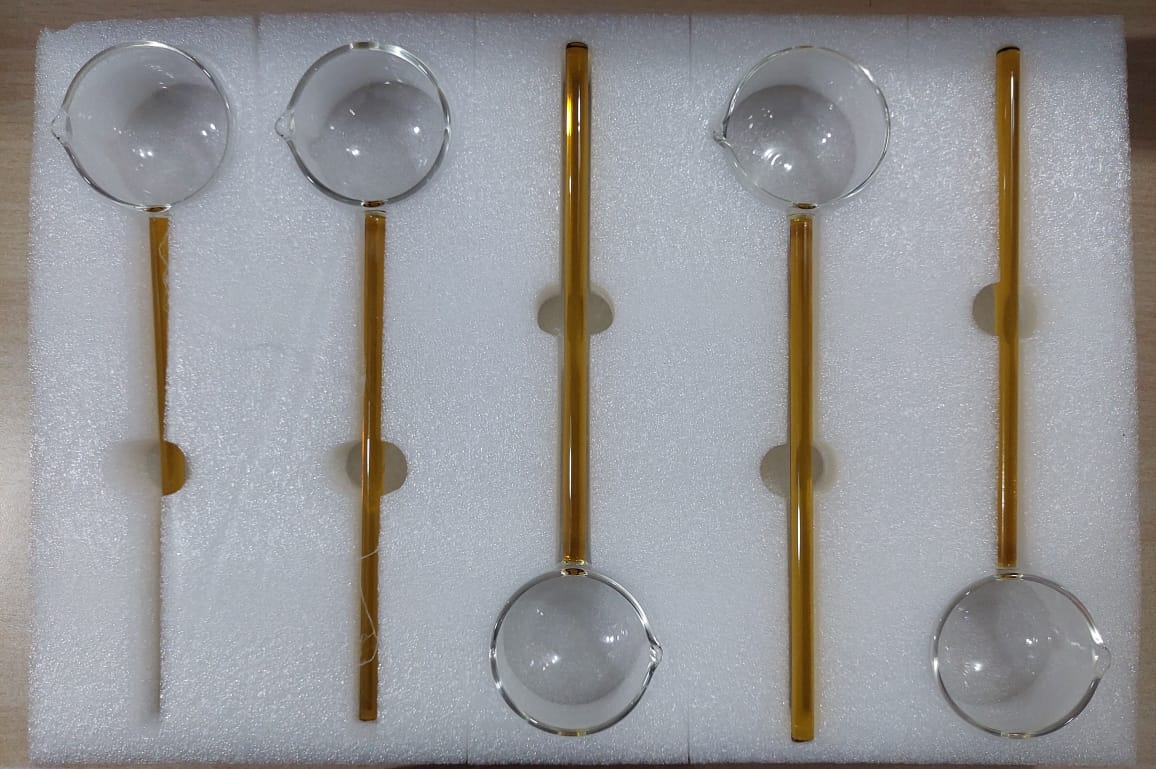 Transparent long glass spoon