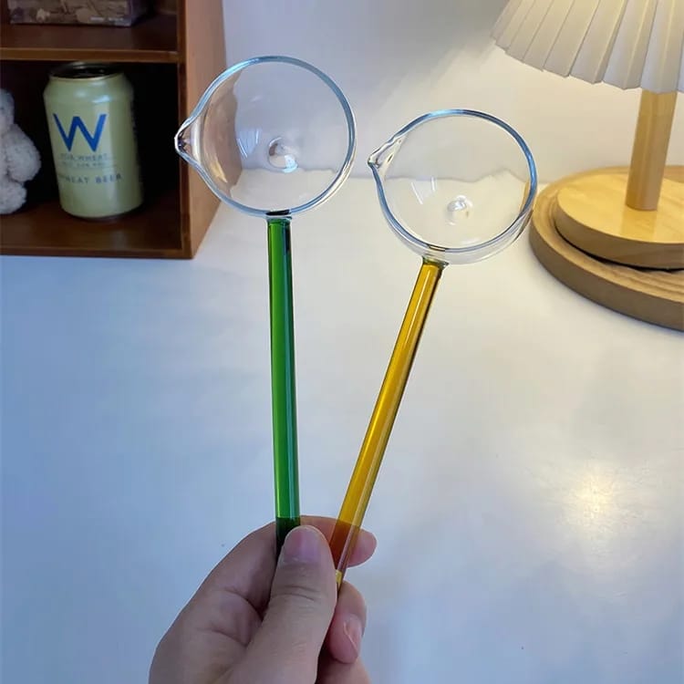 Transparent long glass spoon