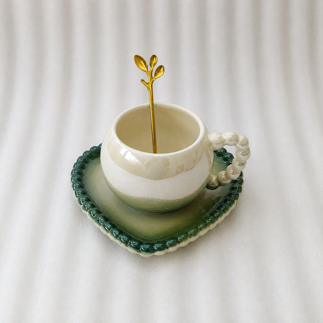 Elegant Ceramic Cup and Saucer Set with Spoon