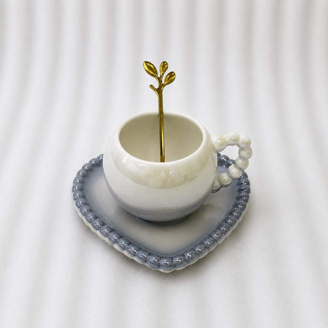 Elegant Ceramic Cup and Saucer Set with Spoon