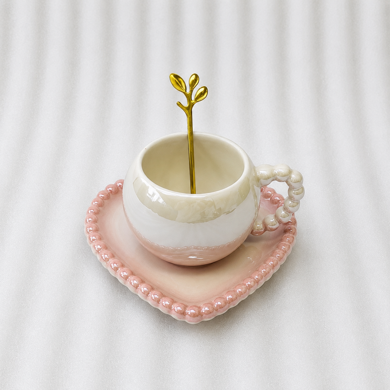 Elegant Ceramic Cup and Saucer Set with Spoon