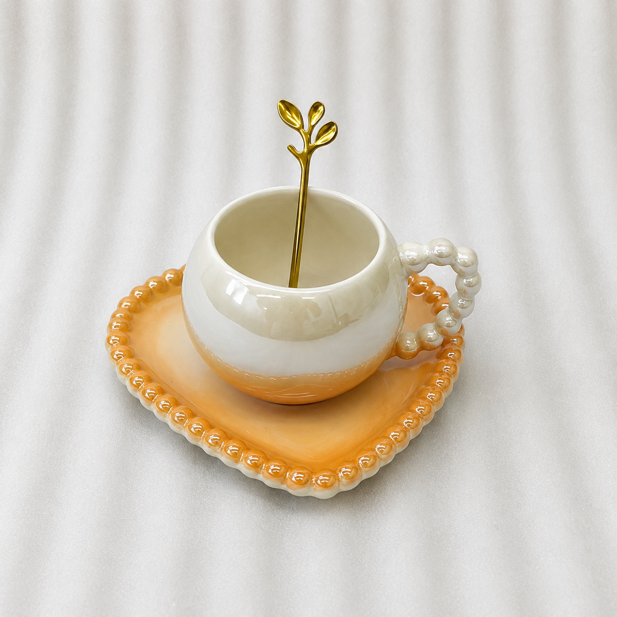 Elegant Ceramic Cup and Saucer Set with Spoon