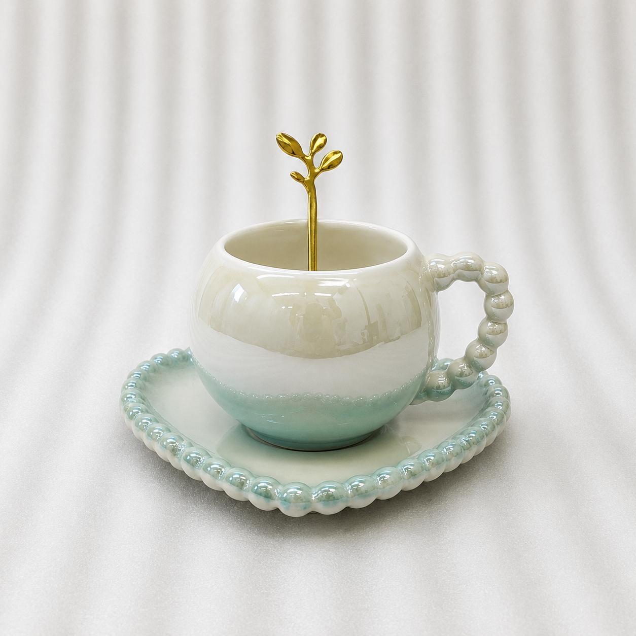 Elegant Ceramic Cup and Saucer Set with Spoon
